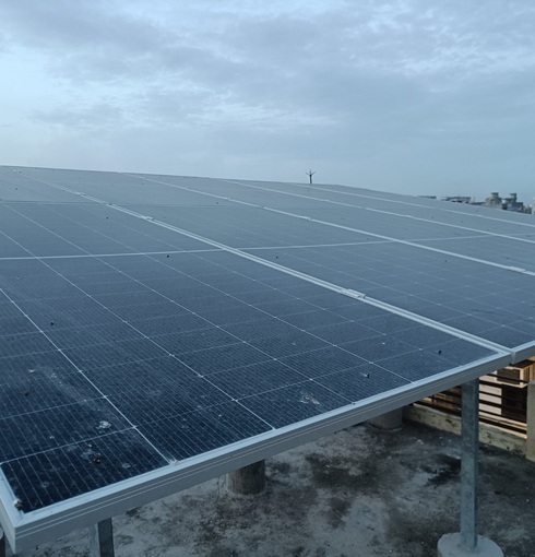 Detail of solar module surface and support rails on a terrace installation